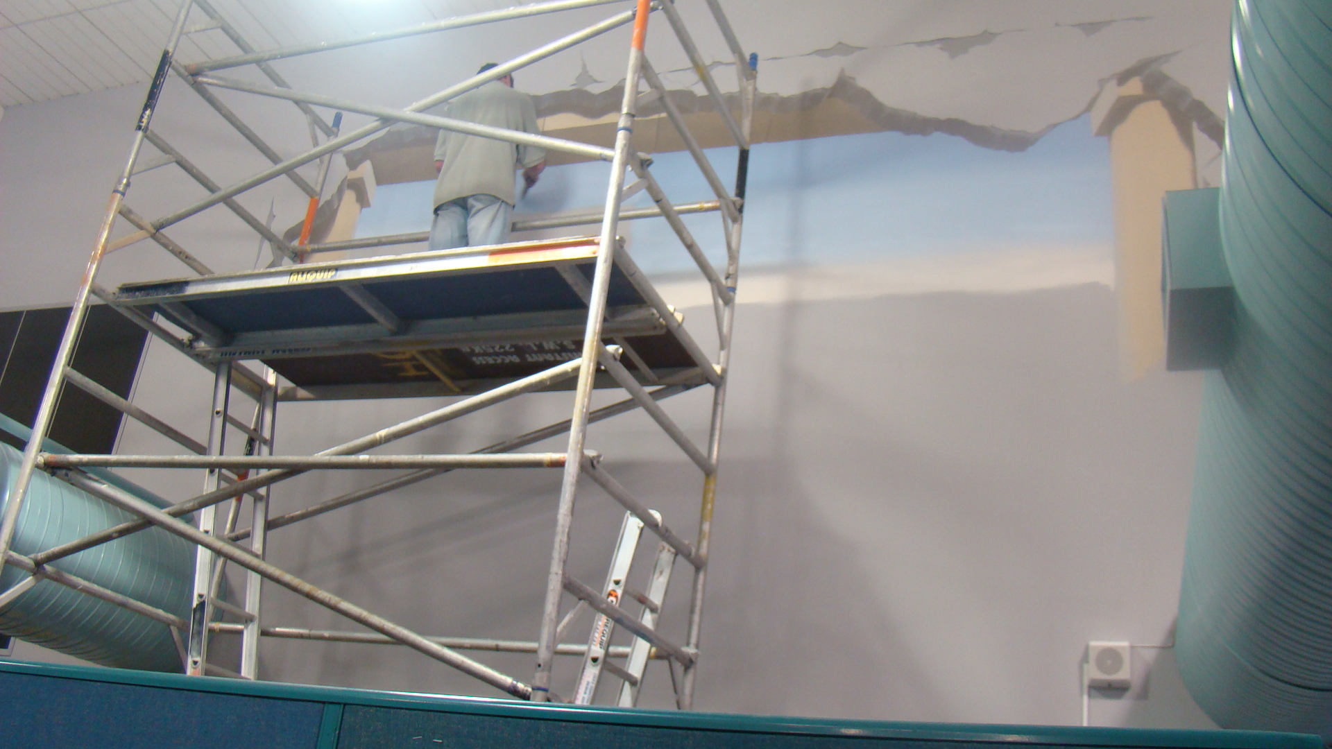 Photograph of a trompe-l'oeil being painted by Marc Spijkerbosch for Rotorua Library