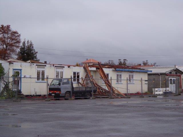 Photograph showing demolition of some of the old hospital wards of QE