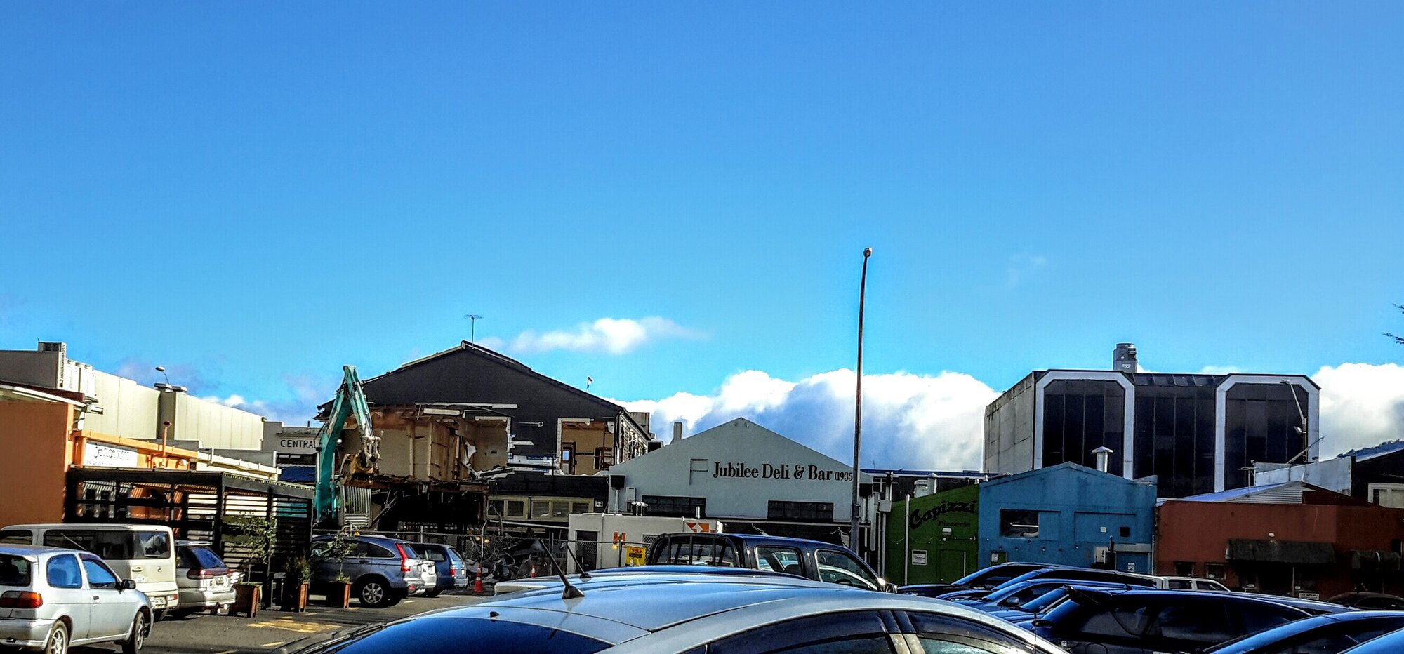 Photograph showing the back of Hennessey's being demolished, the oldest building left in the CBD