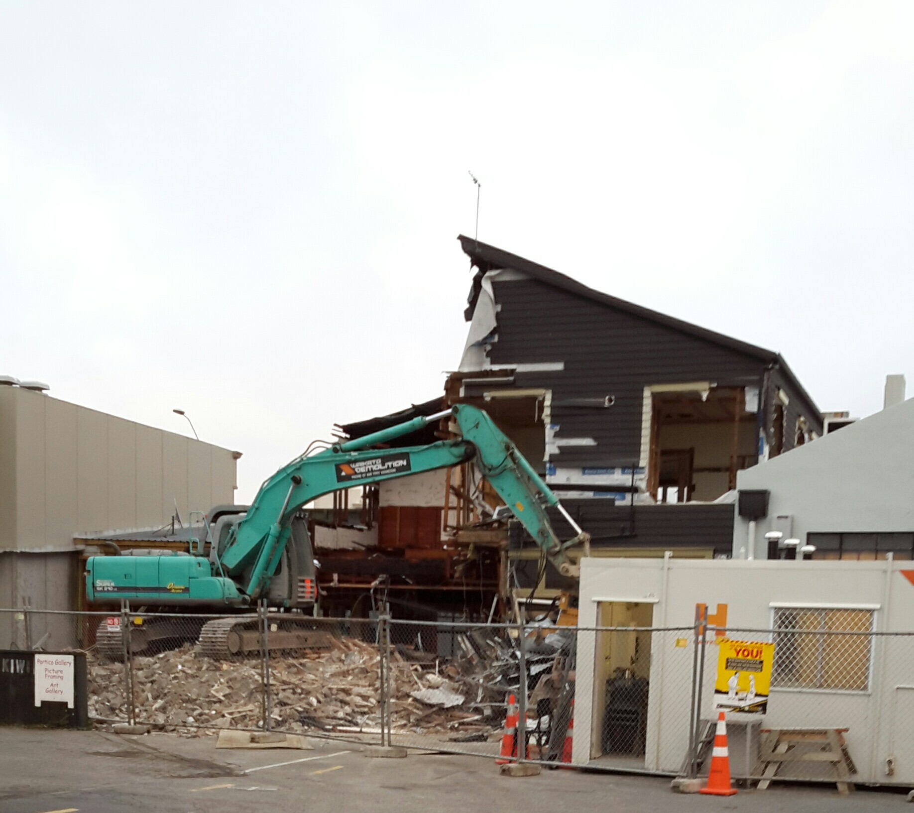 Photograph showing the back of Hennessey's being demolished, the oldest building left in the CBD