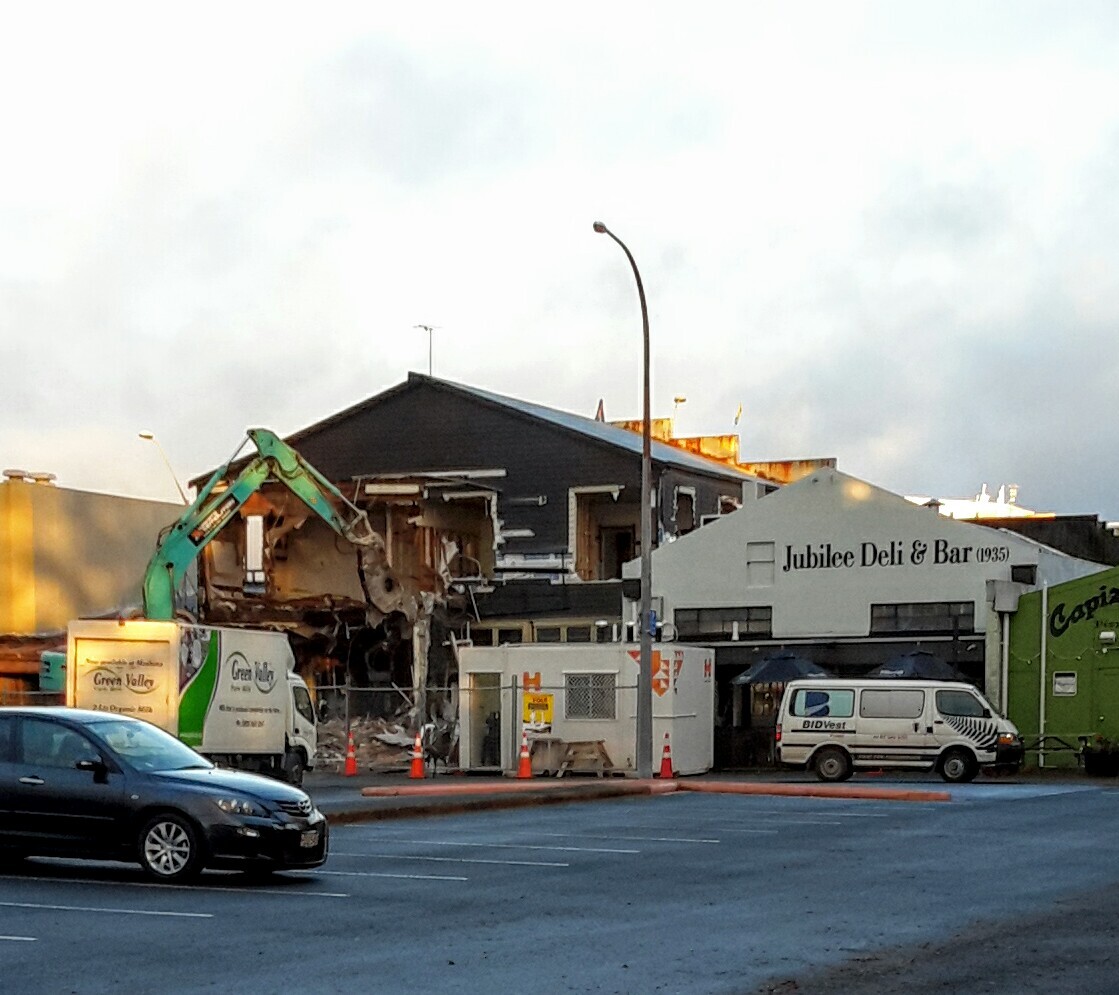 Photograph showing the back of Hennessey's being demolished, the oldest building left in the CBD