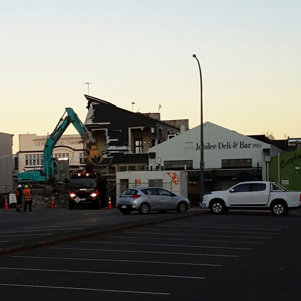 Photograph showing the front of Hennessey's being demolished