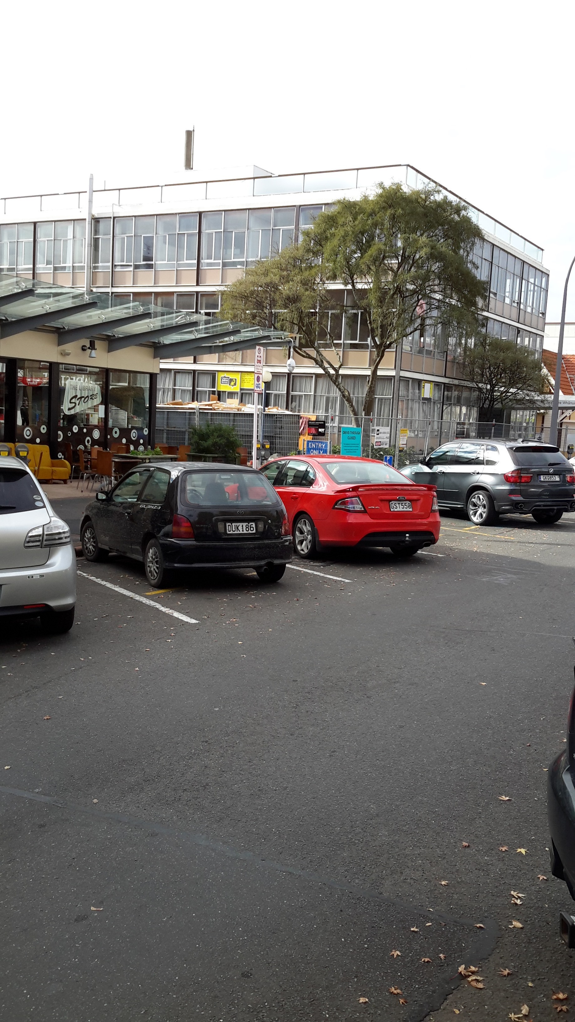 Photograph showing the start of the demolition of Community House from Haupapa Street