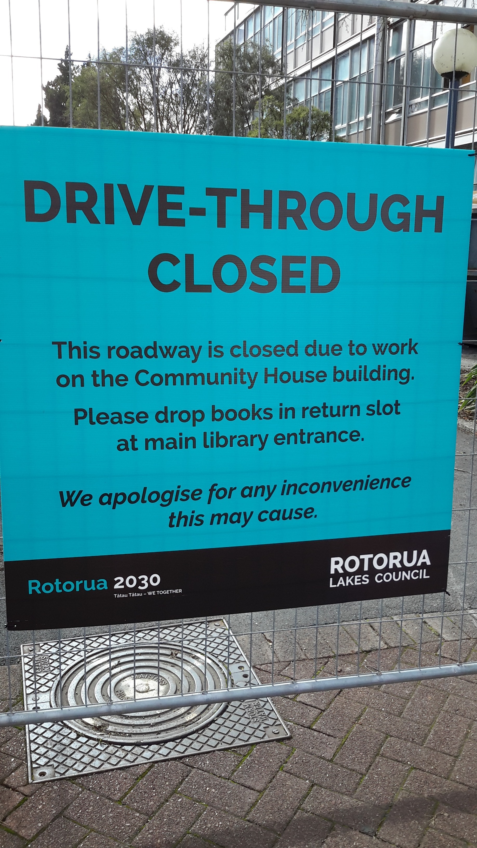 Photograph showing the sign which explained the Rotorua Library drive-through being closed