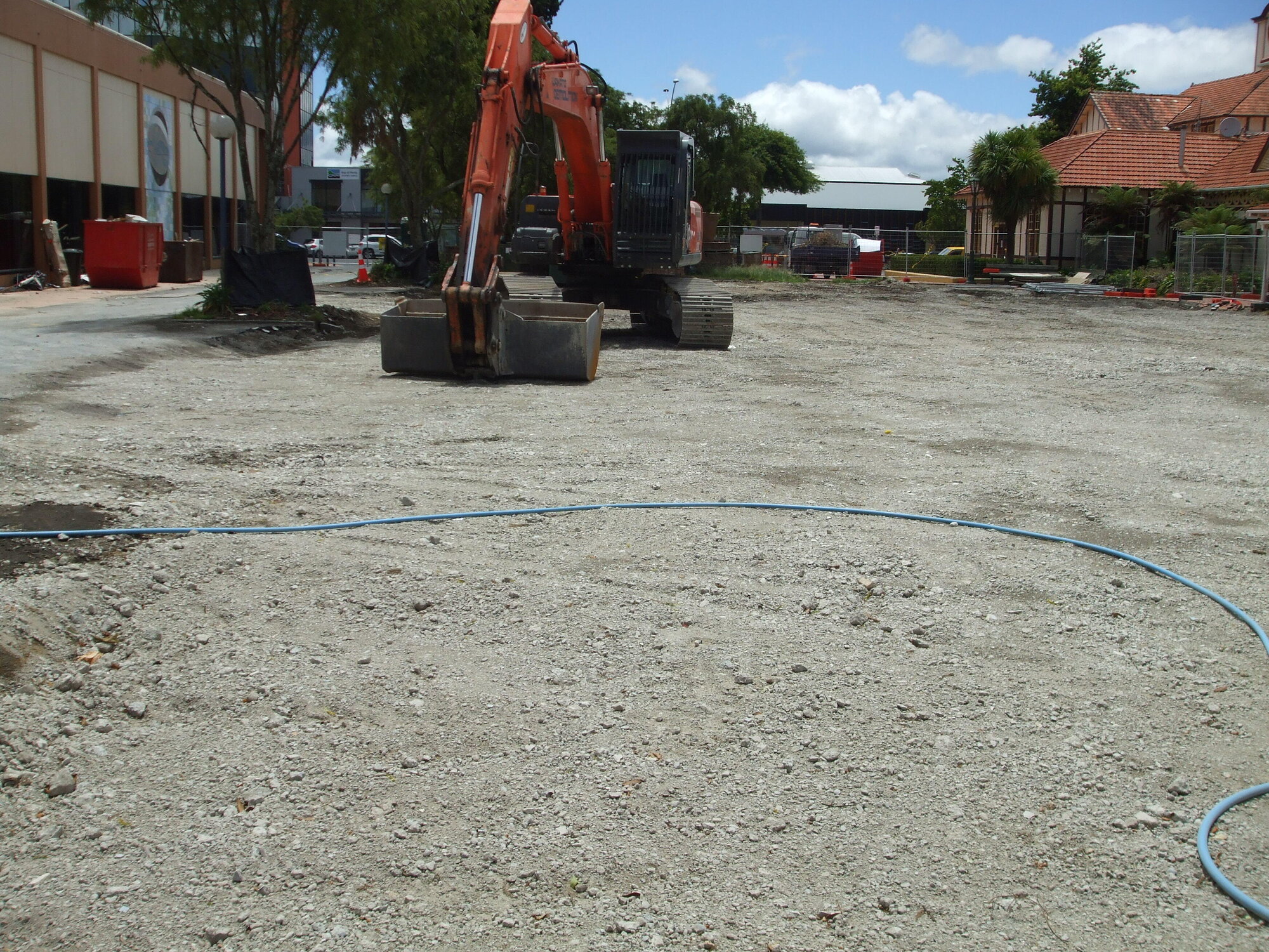 Photograph showing the empty lot where Community House stood since 1964