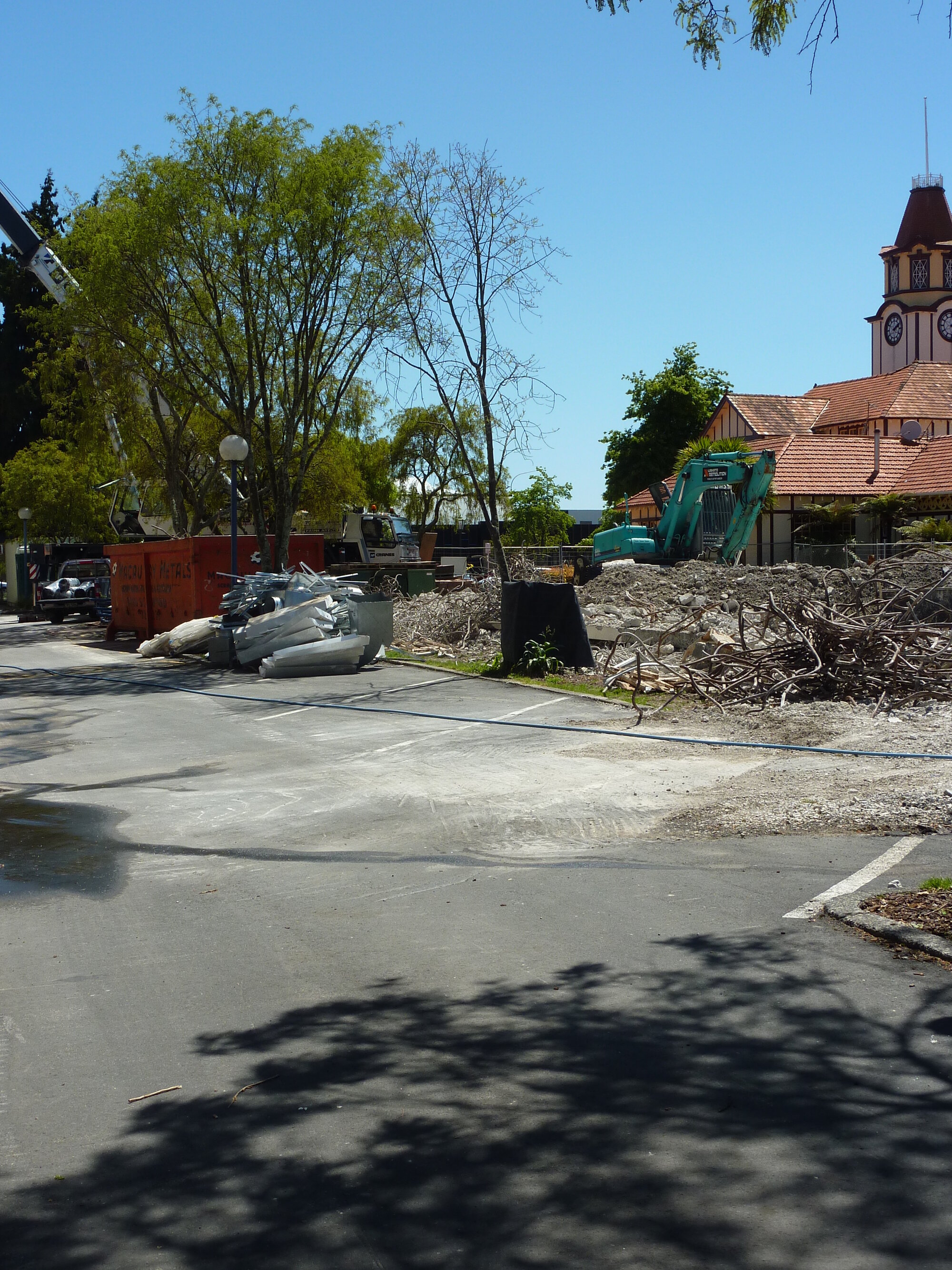 Photograph showing the metal reinforcing rods and removed frames from Community House