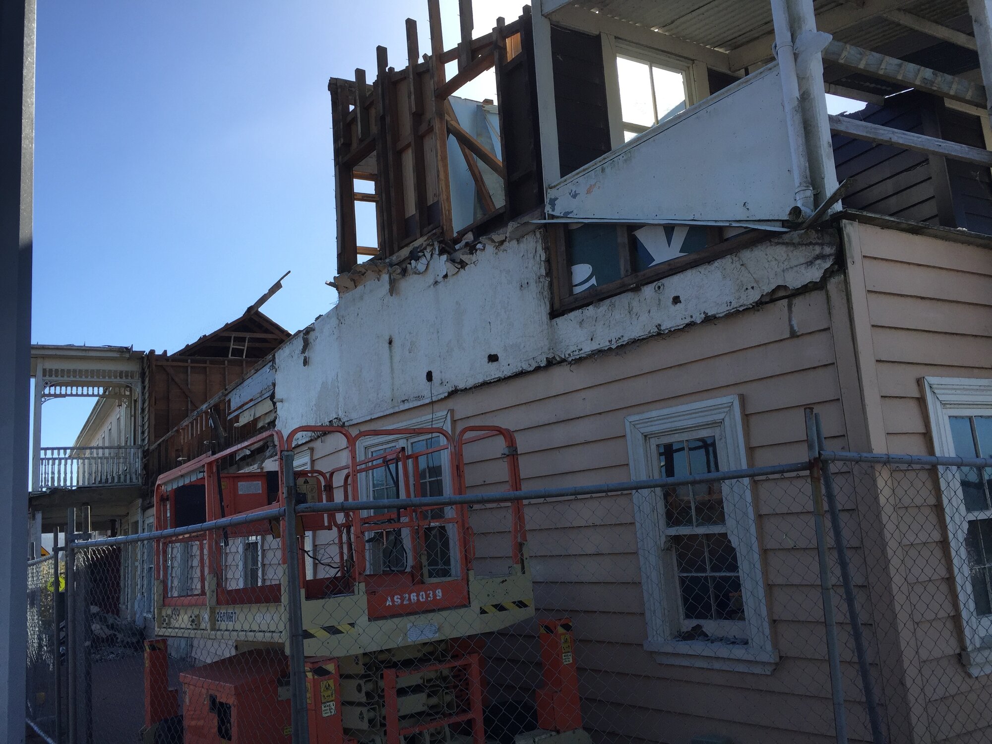 Photograph showing the front of the Lake House Hotel with demolition begun