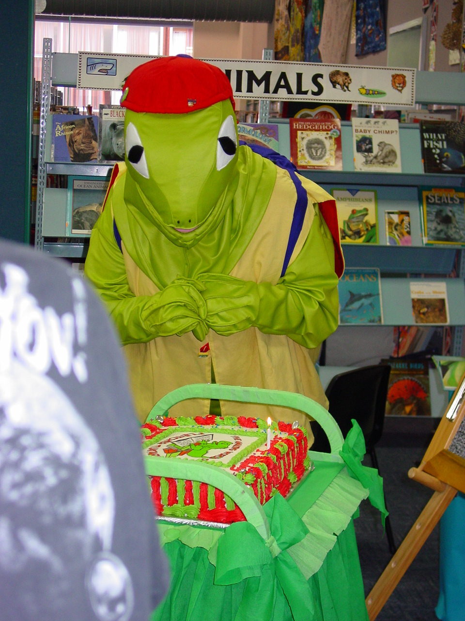 Photograph of Fletcher Tuatara and his birthday cake