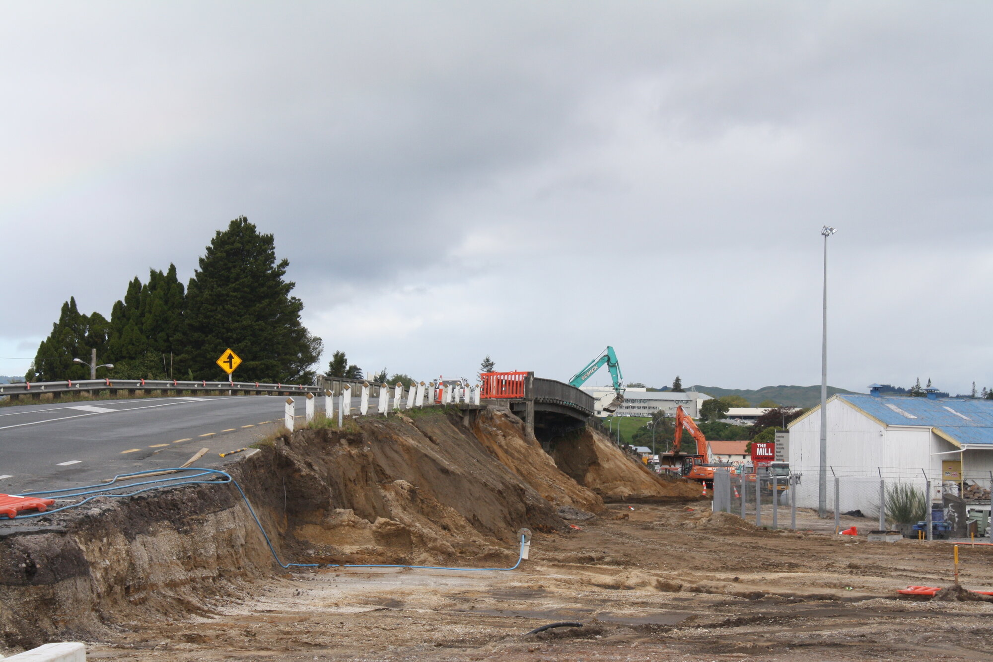 Photograph of the earthworks beside the rail bridge, 2012