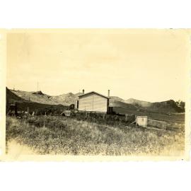 Photograph of the Anderson's farm showing with the farmhouse looking east, ca.1934