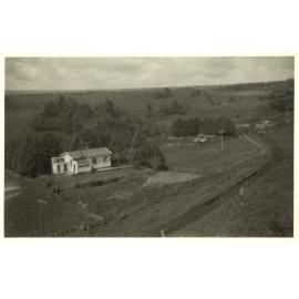 Photograph of Tui Ridge Farm showing the first farmhouse, ca.1957