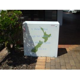 Photograph of a Unison box painted in ca.2017 on the corner of Fenton and Pukuatua Streets
