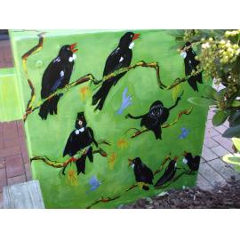 Photograph of a Unison box painted in ca.2017 on the corner of Fenton and Pukuatua Streets