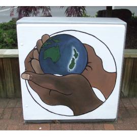Photograph of a Unison box painted in ca.2017 on the corner of Amohia and Pukuatua Streets