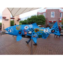 Photograph of side two of "Migrant Fish" by Settlement Support