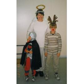 Photograph of staff member Janet with her sons ready for the Rotorua Rotorua Christmas Parade