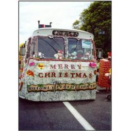 Photograph of the front of the Rotorua Public Library Rotorua Christmas Parade float on the road