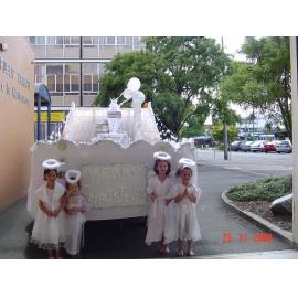 Photograph of the library float for the Rotorua Christmas Parade with small angels