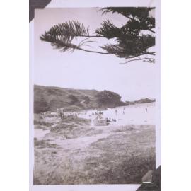 Black and white photograph of a beach scene 
