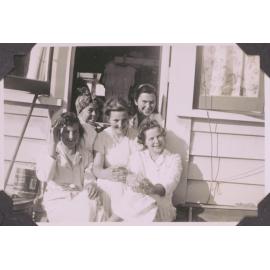 Black and white photograph of six-form students on a weekend at Ōhope titled "Getting up"
