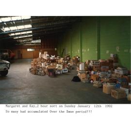 Photograph of storage facility for donated books to be sold 