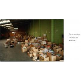 Photograph of storage facility for donated books to be sold 