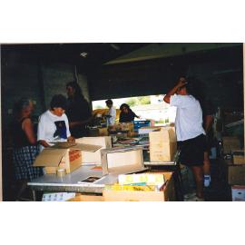 Photograph of Volunteers sorting donations for the Book Fair sportsdrome