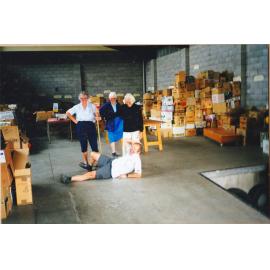 Photograph of Volunteers sorting donations for the Book Fair sportsdrome