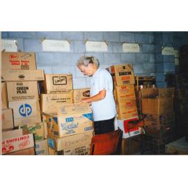 Photograph of Volunteers sorting donations for the Book Fair sportsdrome
