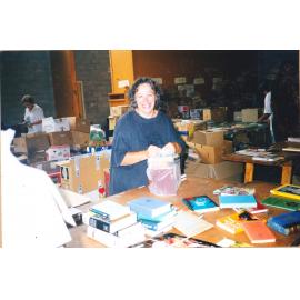Photograph of Volunteers sorting donations for the Book Fair sportsdrome