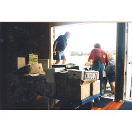 Photograph of Volunteers sorting donations for the Book Fair sportsdrome