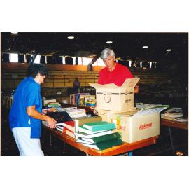 Photograph of Volunteers sorting donations for the Book Fair sportsdrome