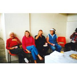 Photograph of volunteers having a much needed cuppa