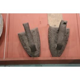 Photograph of clothing irons excavated from the Te Wairoa Village