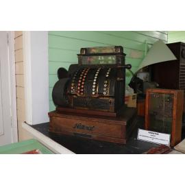 Photograph of the old Whakarewarewa Post Office, showing the cash register