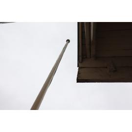 Photograph of the old Whakarewarewa Post Office, showing the flag pole