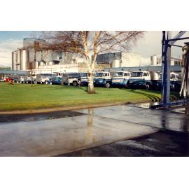 Photograph of milk tankers unloading at the factory, 1980