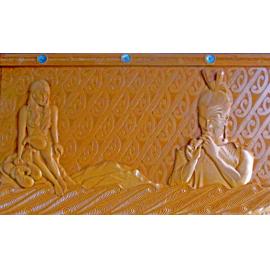 Photograph of a carving of Hinemoa and Tūtanekai, installed in the Haupapa Street end of the Rotorua Library stairwell