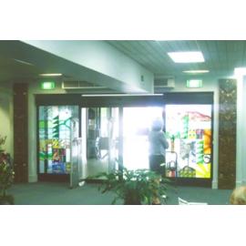 Photograph of the stained-glass panels by John and Jenny Skudder, after being moved to the second floor of Rotorua Library