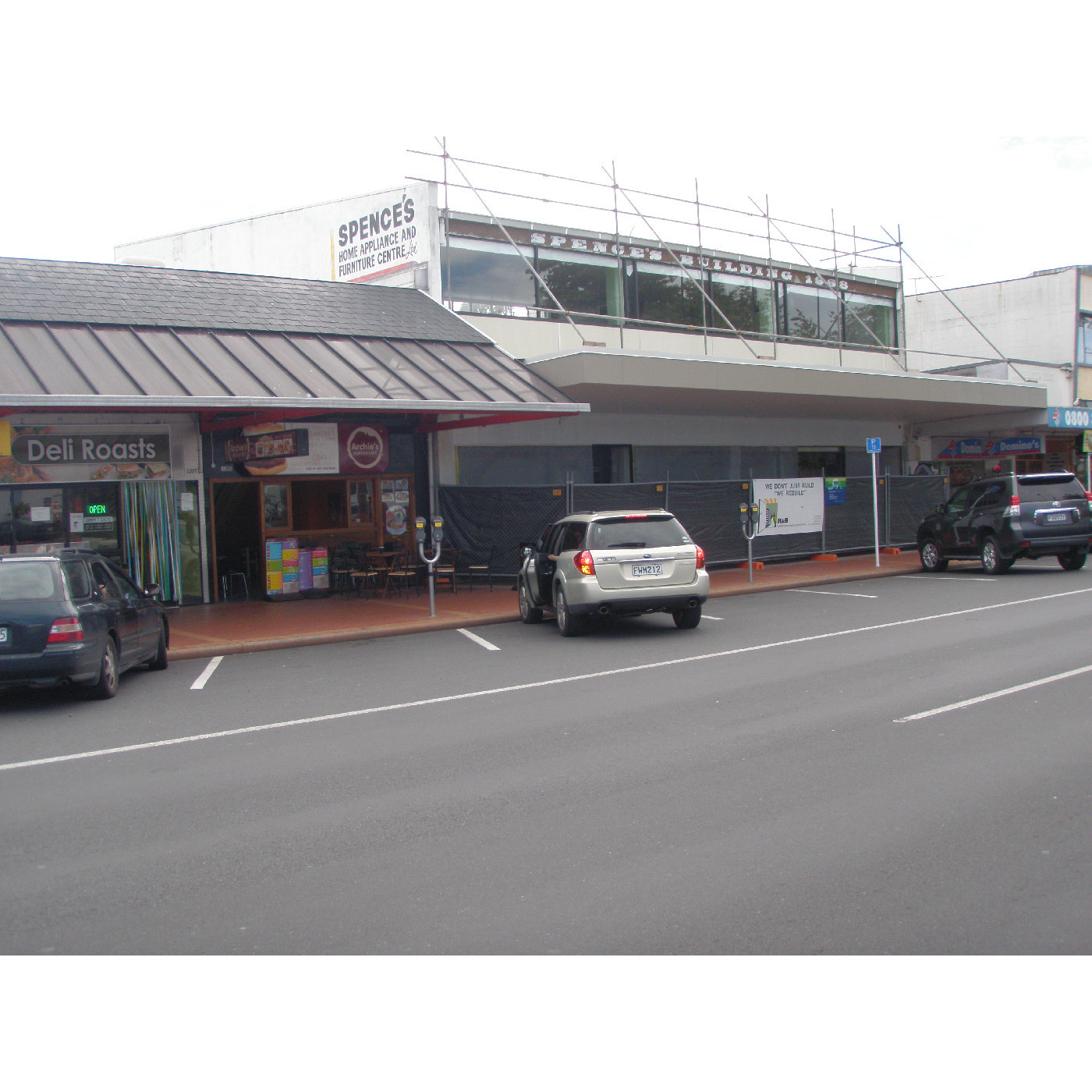 Photographs documenting the demolition of Rotorua buildings and the rebuild of one of them