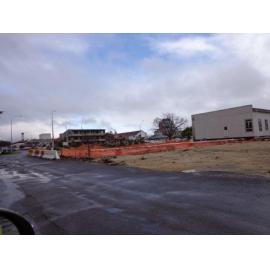 Photograph showing demolition of some of the old hospital wards of QE