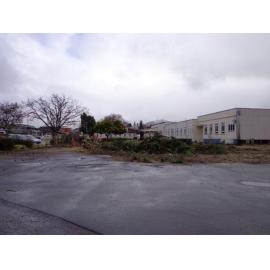 Photograph showing demolition of some of the old hospital wards of QE