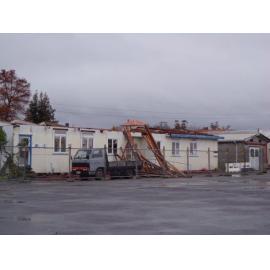Photograph showing demolition of some of the old hospital wards of QE