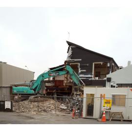 Photograph showing the back of Hennessey's being demolished, the oldest building left in the CBD