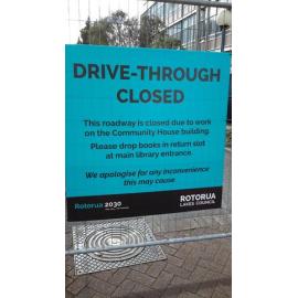 Photograph showing the sign which explained the Rotorua Library drive-through being closed