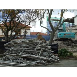 Photograph showing the old window frames removed from Community House 