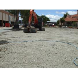 Photograph showing the empty lot where Community House stood since 1964