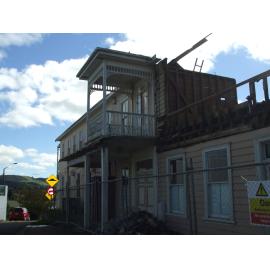 Photograph showing the front of the Lake House Hotel with demolition begun