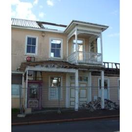 Photograph showing the front of the Lake House Hotel with demolition begun