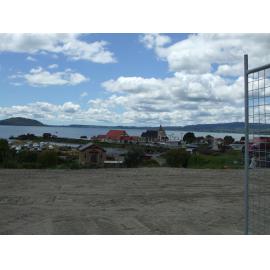 Photograph showing the empty site where the Lake House Hotel stood since 1872